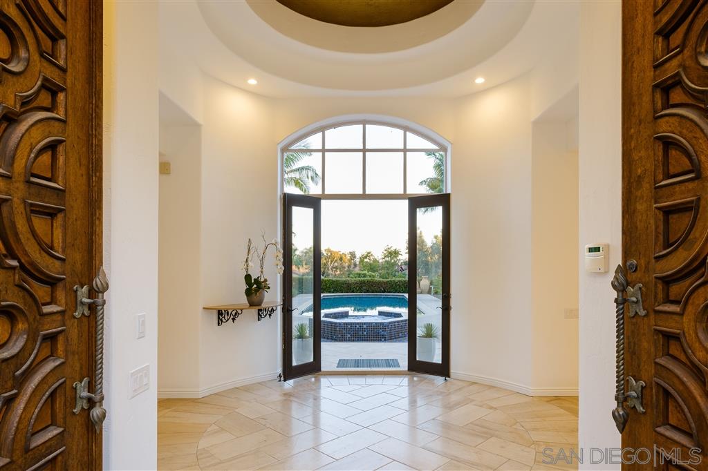 7060 Rancho Cielo Rancho Santa Fe, CA 92067 - Photo 3 of 25 a view of an entryway with a livingroom
