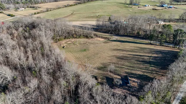 a view of a backyard of the house