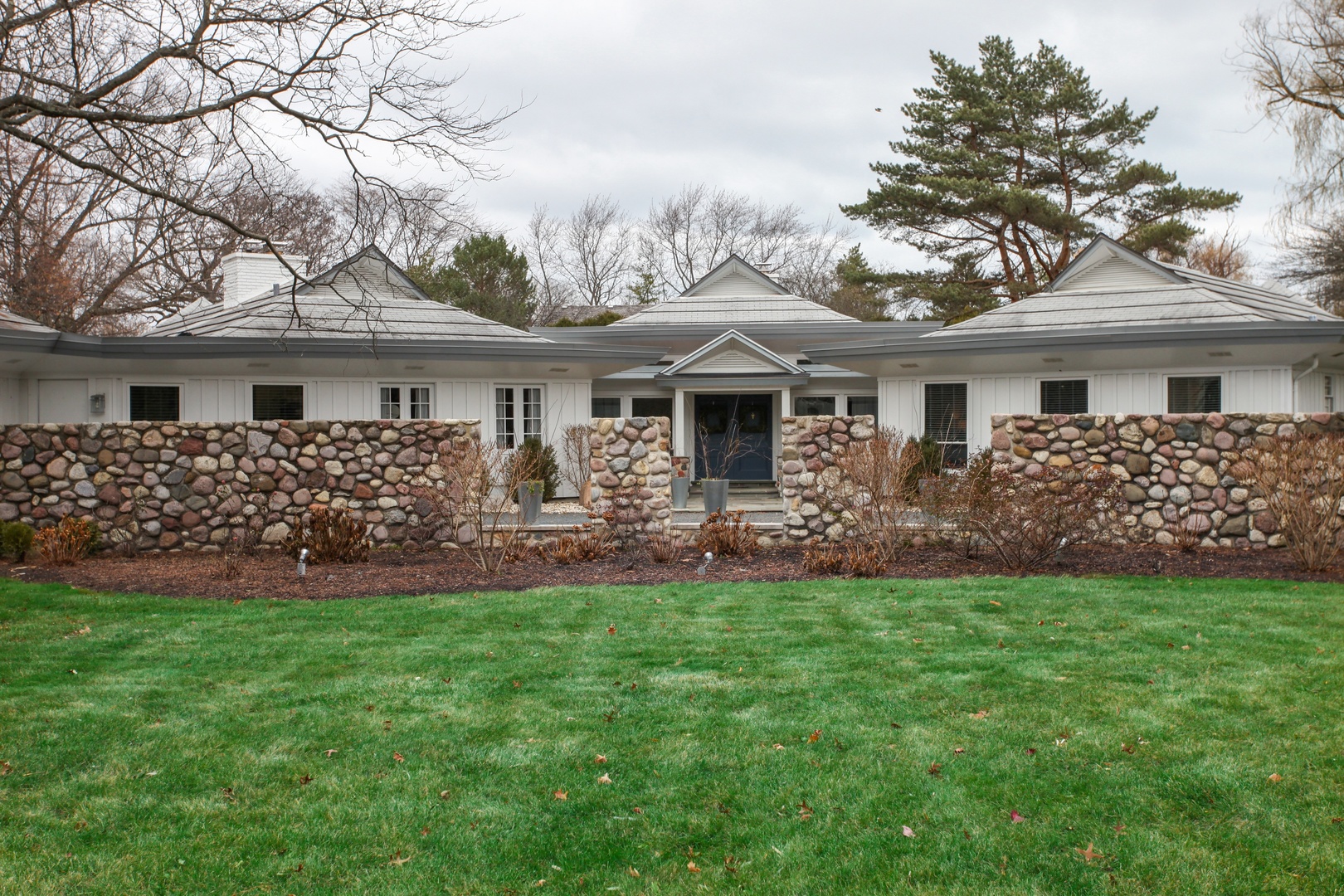 13 Meadowview Road Northfield, IL 60093 - Photo 1 of 23 a front view of house with yard and green space
