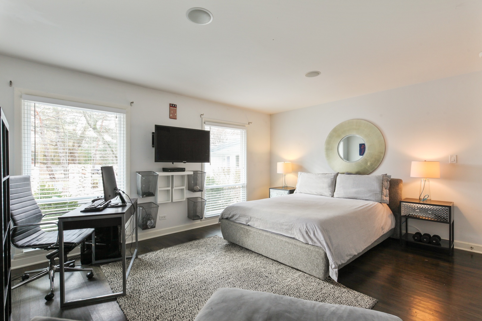 13 Meadowview Road Northfield, IL 60093 - Photo 15 of 23 a bedroom with a bed a large window and a flat screen tv