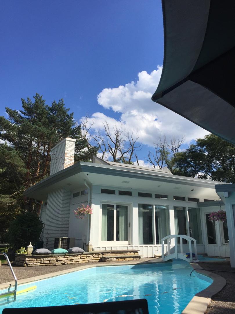13 Meadowview Road Northfield, IL 60093 - Photo 22 of 23 a view of a swimming pool with a patio