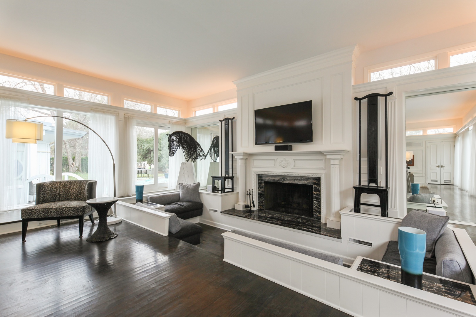 13 Meadowview Road Northfield, IL 60093 - Photo 5 of 23 a living room with furniture fireplace and flat screen tv