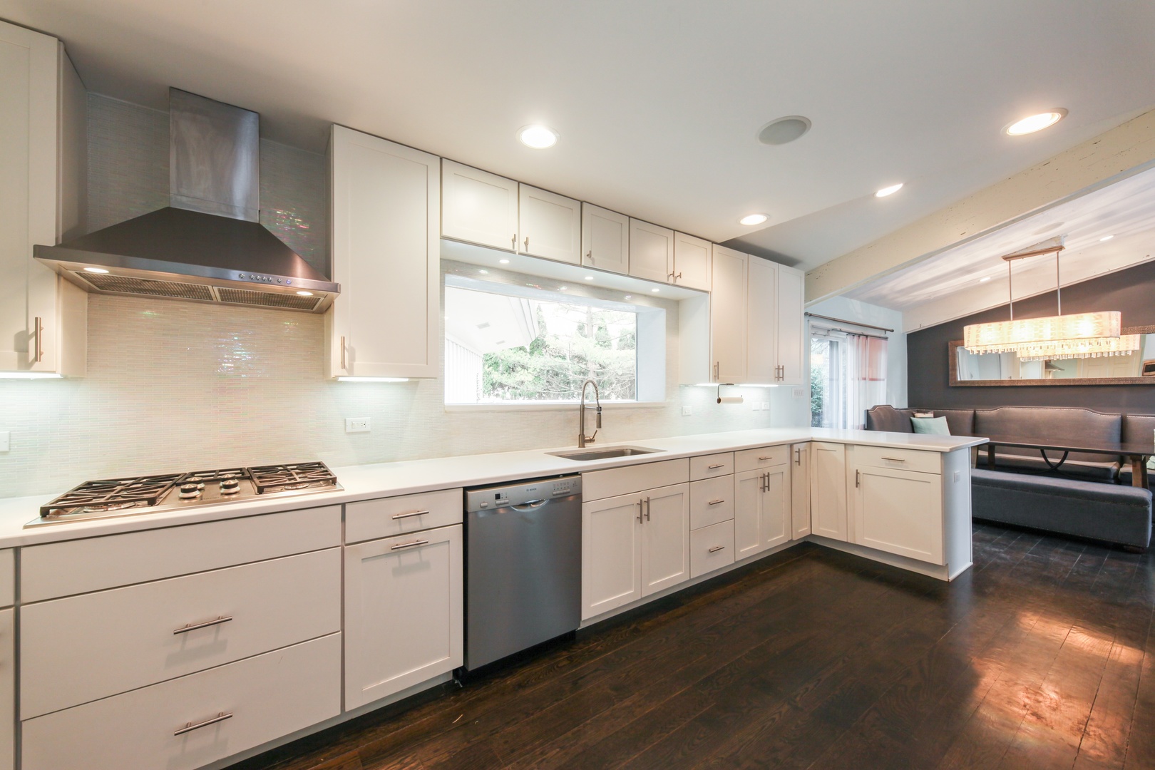 13 Meadowview Road Northfield, IL 60093 - Photo 7 of 23 a kitchen with sink stove and cabinets