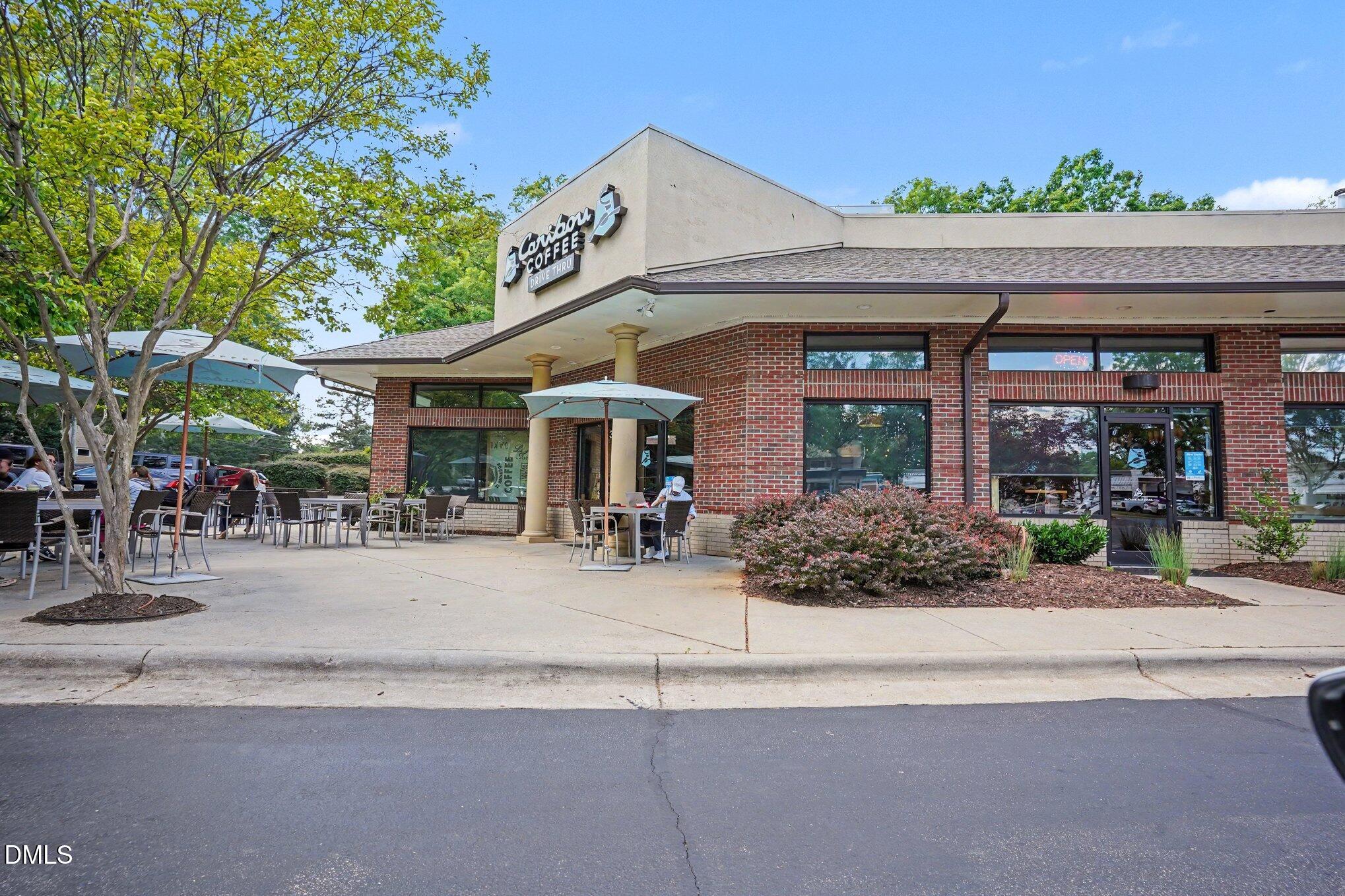 3555 Mill Run Raleigh, NC 27612 - Photo 20 of 25 a view of a building with a patio