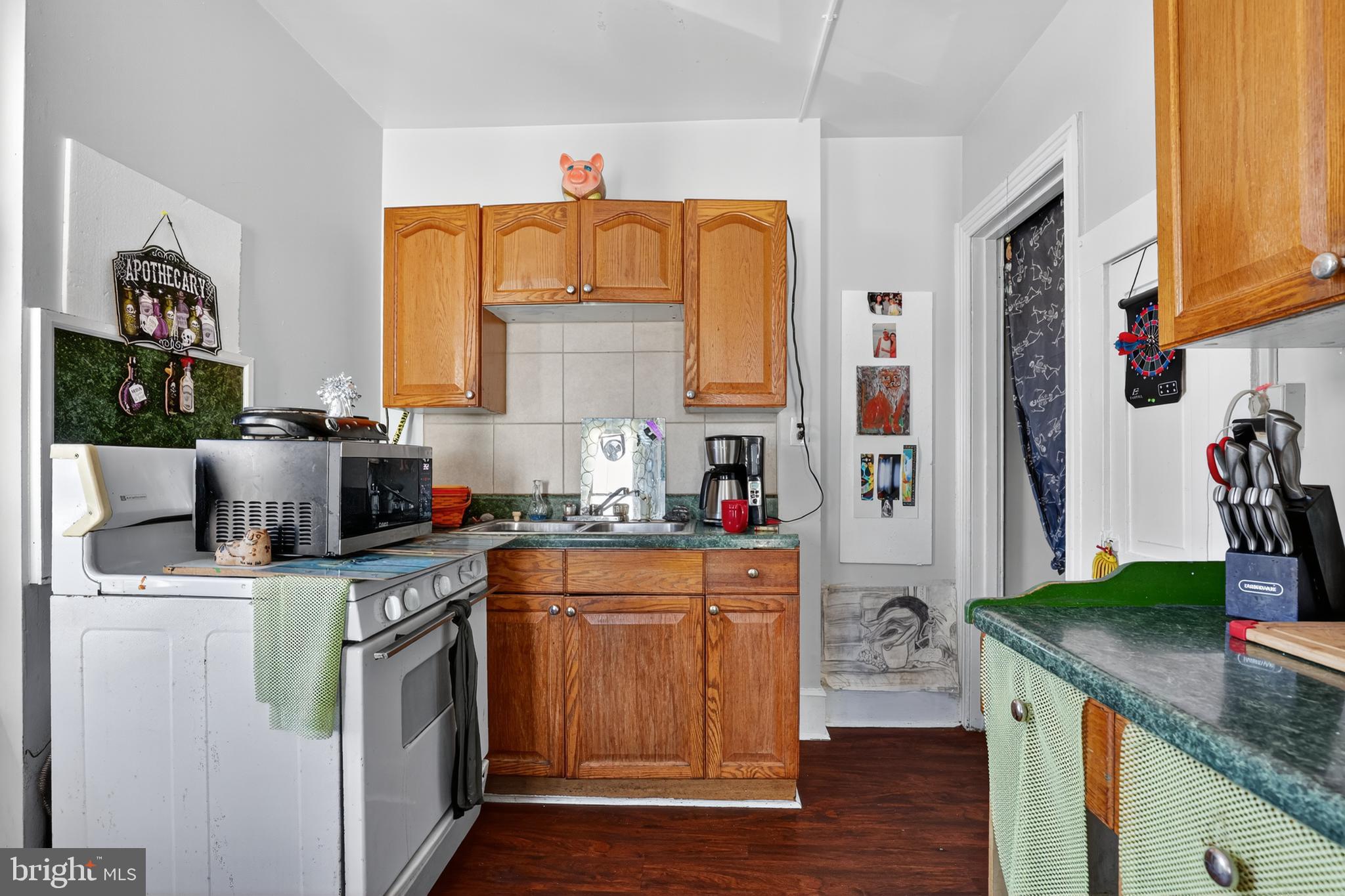 17-19 South 3rd Street Reading, PA 19602 - Photo 34 of 45 a kitchen with stainless steel appliances granite countertop a sink stove and refrigerator
