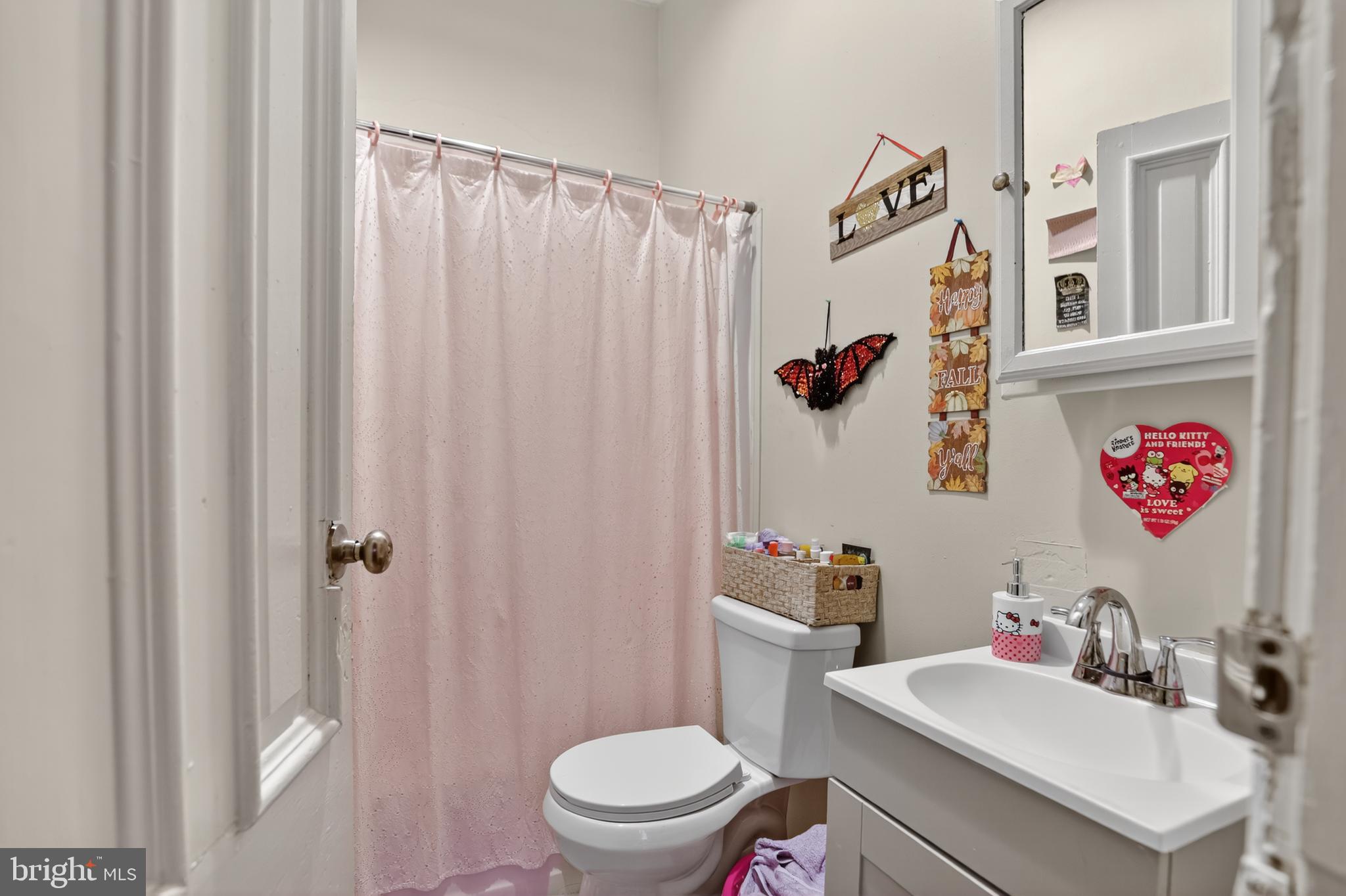 17-19 South 3rd Street Reading, PA 19602 - Photo 42 of 45 a bathroom with a sink and a toilet