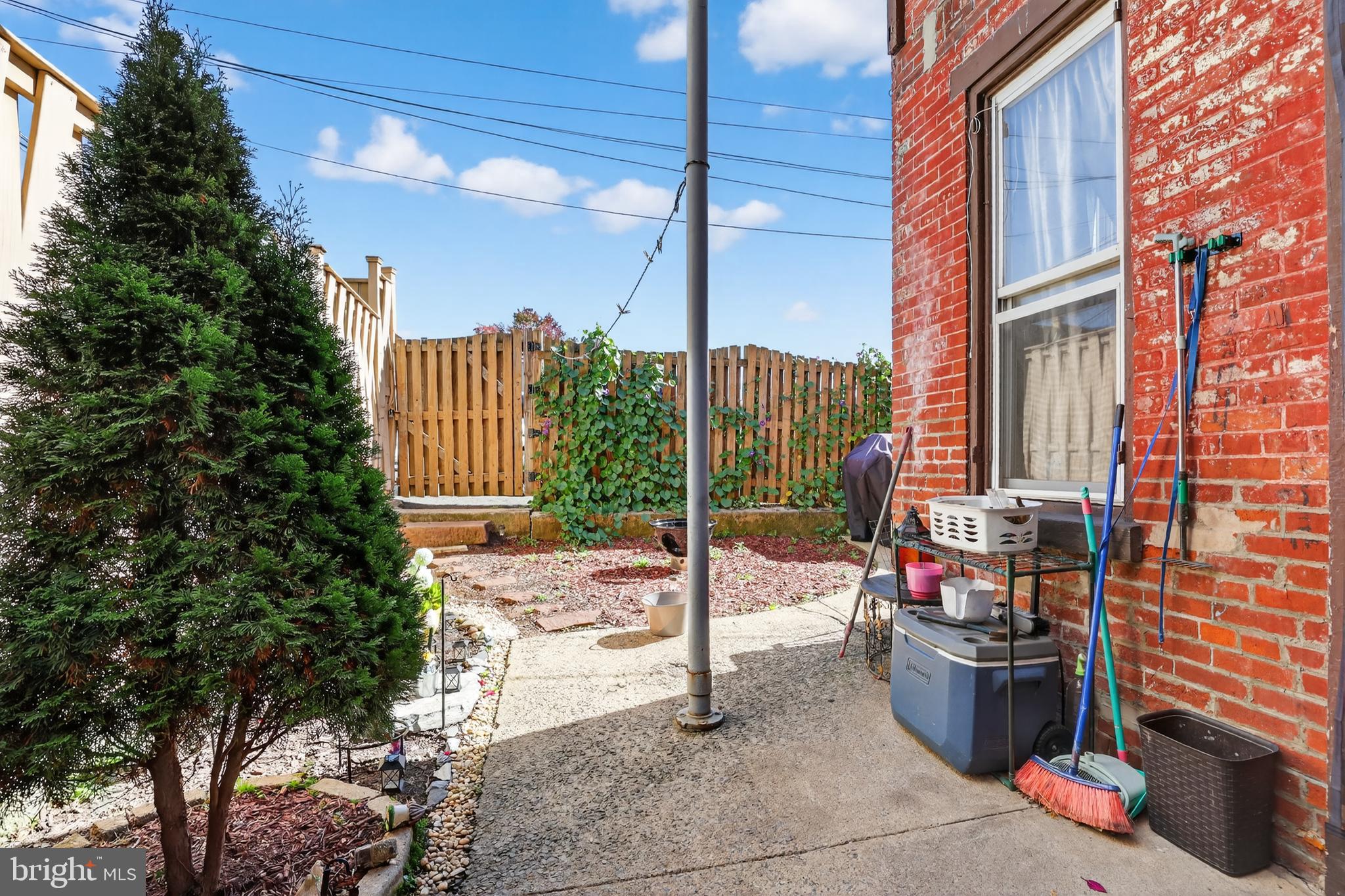 17-19 South 3rd Street Reading, PA 19602 - Photo 8 of 45 a view of a patio with a table and chairs and potted plants