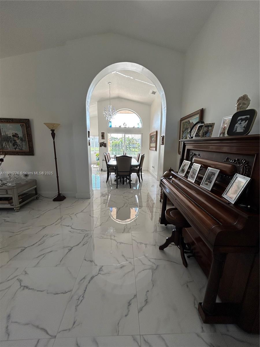 16620 Southwest 101st Terrace, Unit 1 Miami, FL 33196 - Photo 11 of 13 a view of a livingroom with furniture