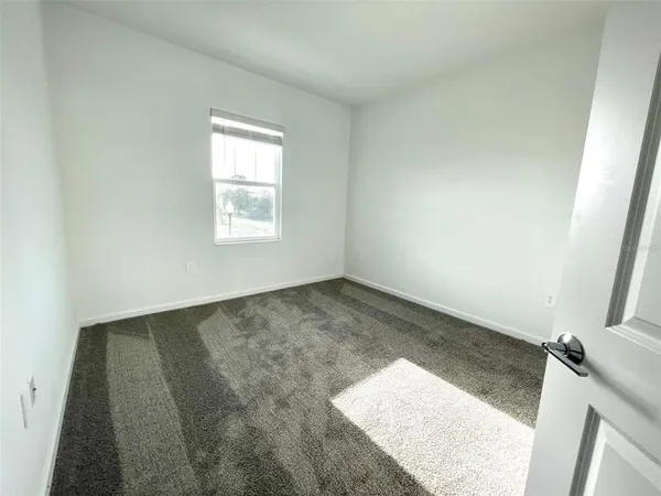 an empty room with a natural light