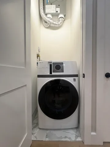 a utility room with a washer and dryer