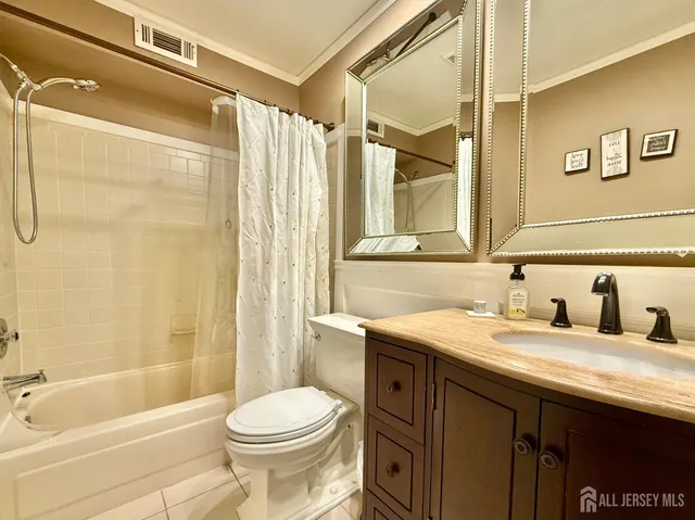 a bathroom with a sink a toilet and a bathtub
