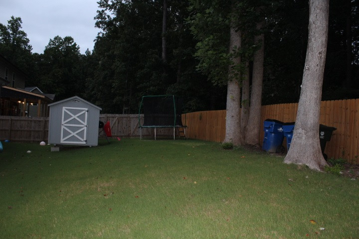 7410 Randshire Way Raleigh, NC 27616 - Photo 17 of 18 Private fenced back yard w/ storage building.