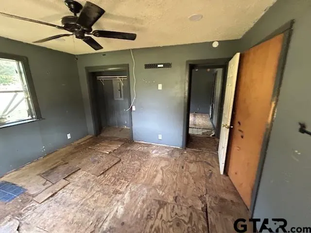 a view of a hallway with a chandelier