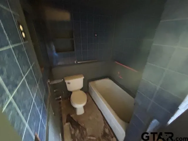 a bathroom with a sink and toilet