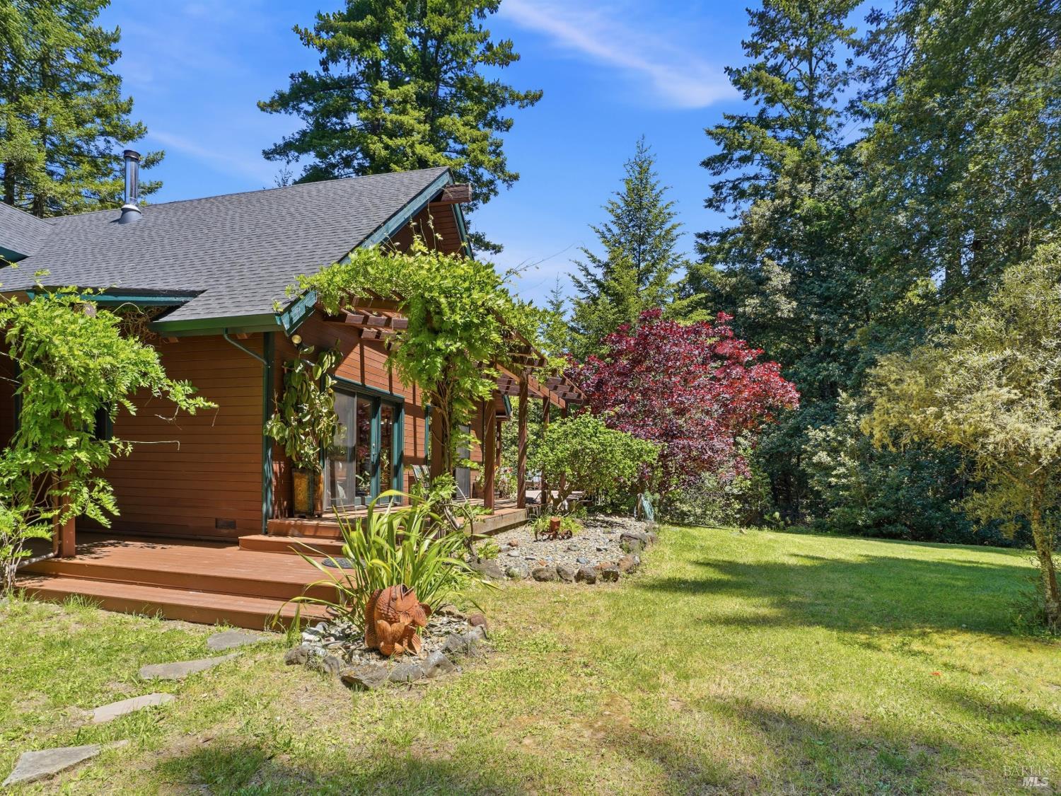 31397 Seaview Road Cazadero, CA 95421 - Photo 35 of 47 a view of a house with a yard