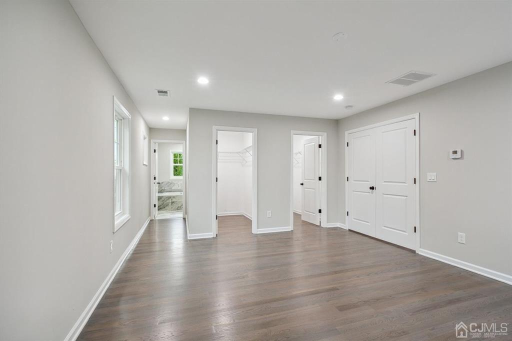 109 Idlewild Road Edison, NJ 08817 - Photo 11 of 15 a view of an empty room with wooden floor