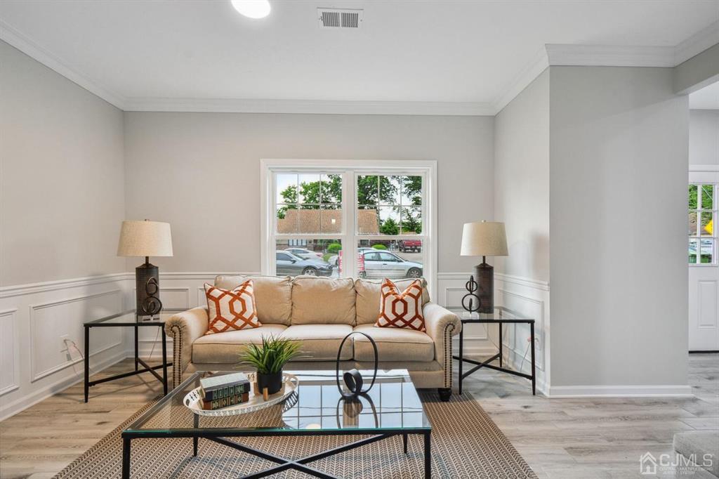 109 Idlewild Road Edison, NJ 08817 - Photo 4 of 15 a living room with furniture and a large window