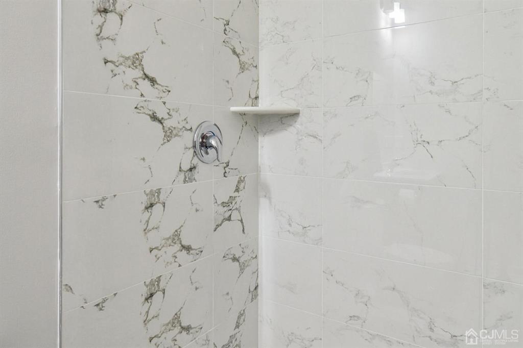 109 Idlewild Road Edison, NJ 08817 - Photo 8 of 15 a bathroom with a shower