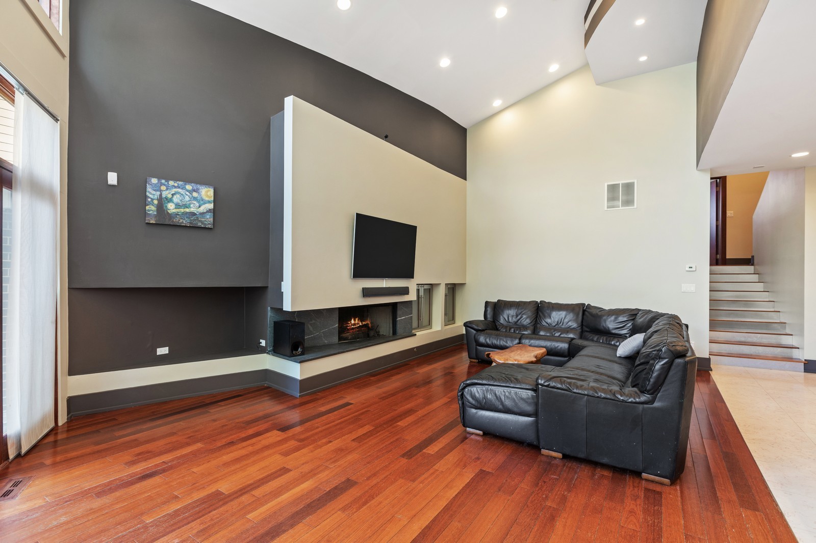 1565 Harding Road Northfield, IL 60093 - Photo 11 of 35 a living room with furniture and a flat screen tv