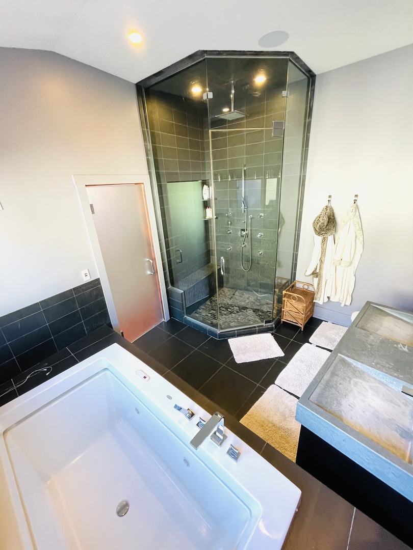1565 Harding Road Northfield, IL 60093 - Photo 15 of 35 a bathroom with a mirror and a shower