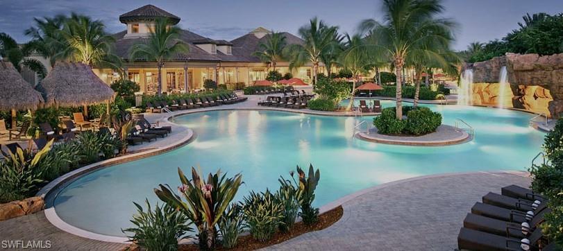 9054 Capistrano Street North, Unit 4003 Naples, FL 34113 - Photo 47 of 49 a view of a swimming pool with a patio