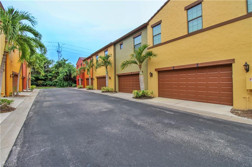 9054 Capistrano Street North, Unit 4003 Naples, FL 34113 - Photo 7 of 49 a view of a house with a street