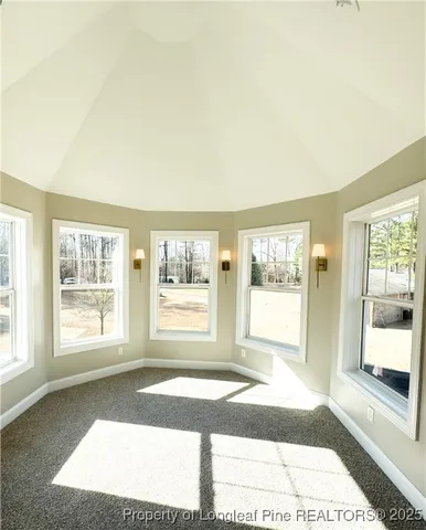 a view of a room with windows