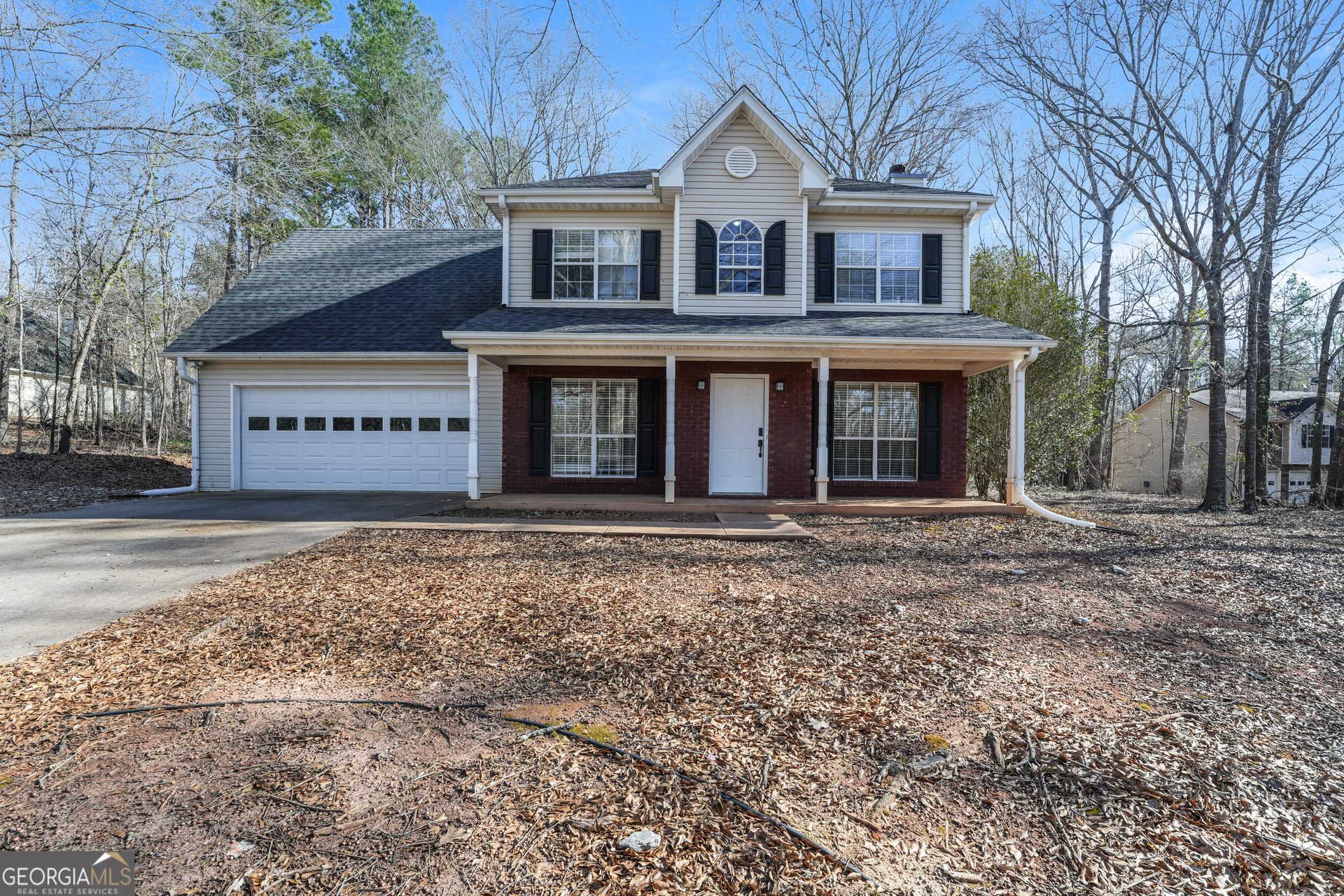 310 Alcovy Way Covington, GA 30014 - Photo 1 of 22 a front view of a house with a yard