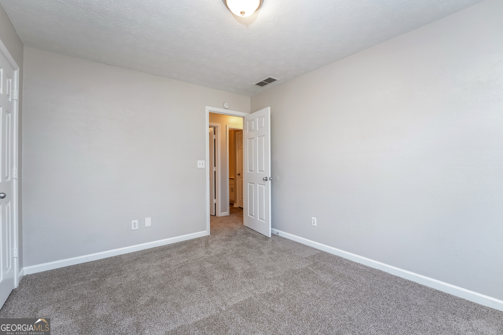 310 Alcovy Way Covington, GA 30014 - Photo 18 of 22 a view of an empty room