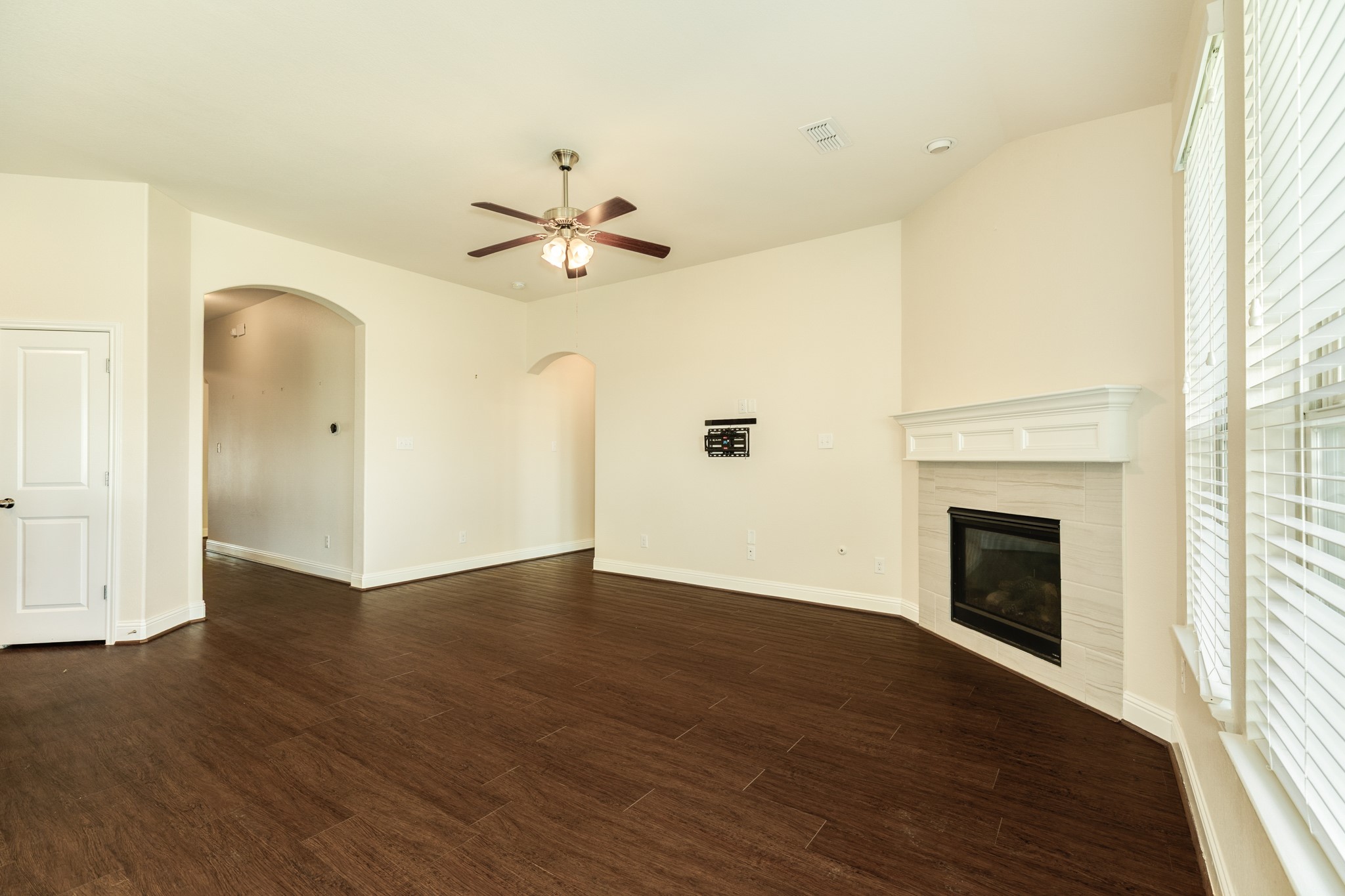 3519 Bay Drive Rosharon, TX 77583 - Photo 12 of 49 Beautifully maintained fireplace centerpiece with durable, low-maintenance flooring throughout the main living area.