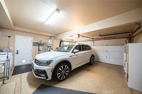 a bathroom with a sink toilet and mirror