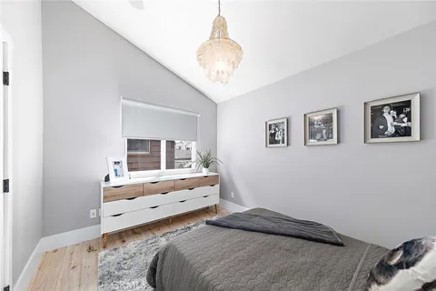 a living room with furniture and white walls