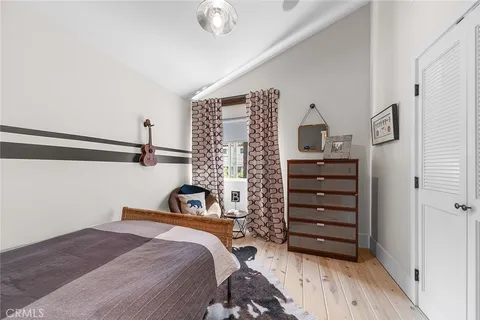 a kitchen with a stove and a shower