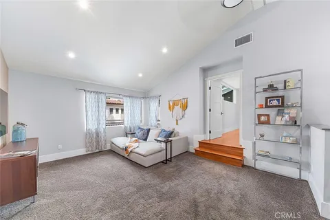a dining room with a table and chairs