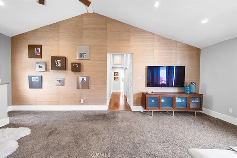 a view of a dinning tables and chairs in patio of the house