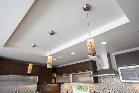 a living room with furniture fireplace and window