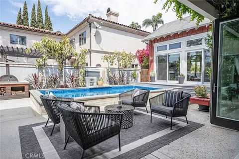a bathroom with a toilet and a mirror