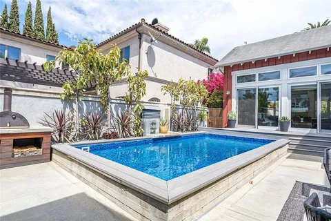 a bathroom with a tub and a sink