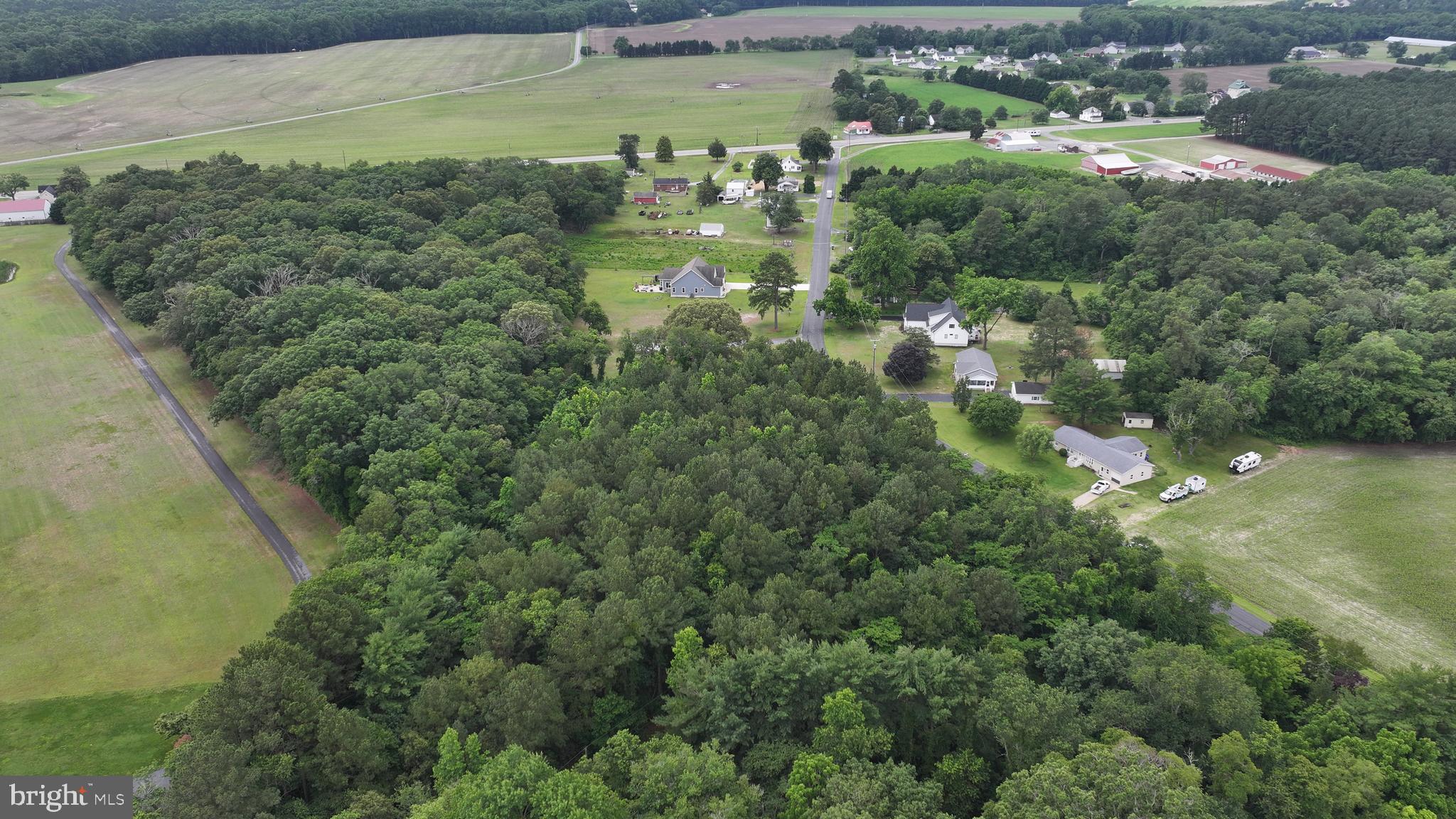 0 Helms Landing Road Dagsboro, DE 19939 - Photo 6 of 10 a view of a lake with a houses