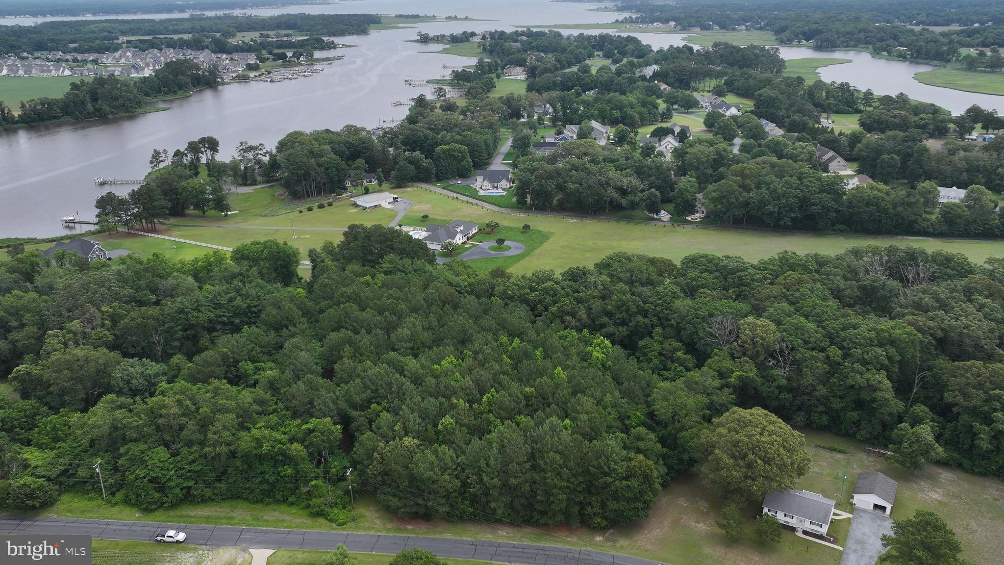 0 Helms Landing Road Dagsboro, DE 19939 - Photo 9 of 10 an aerial view of residential houses with outdoor space and trees