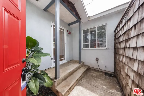 a view of balcony with potted plant