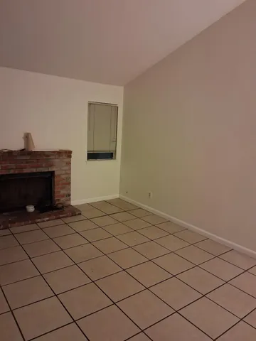 a view of a livingroom with a fireplace