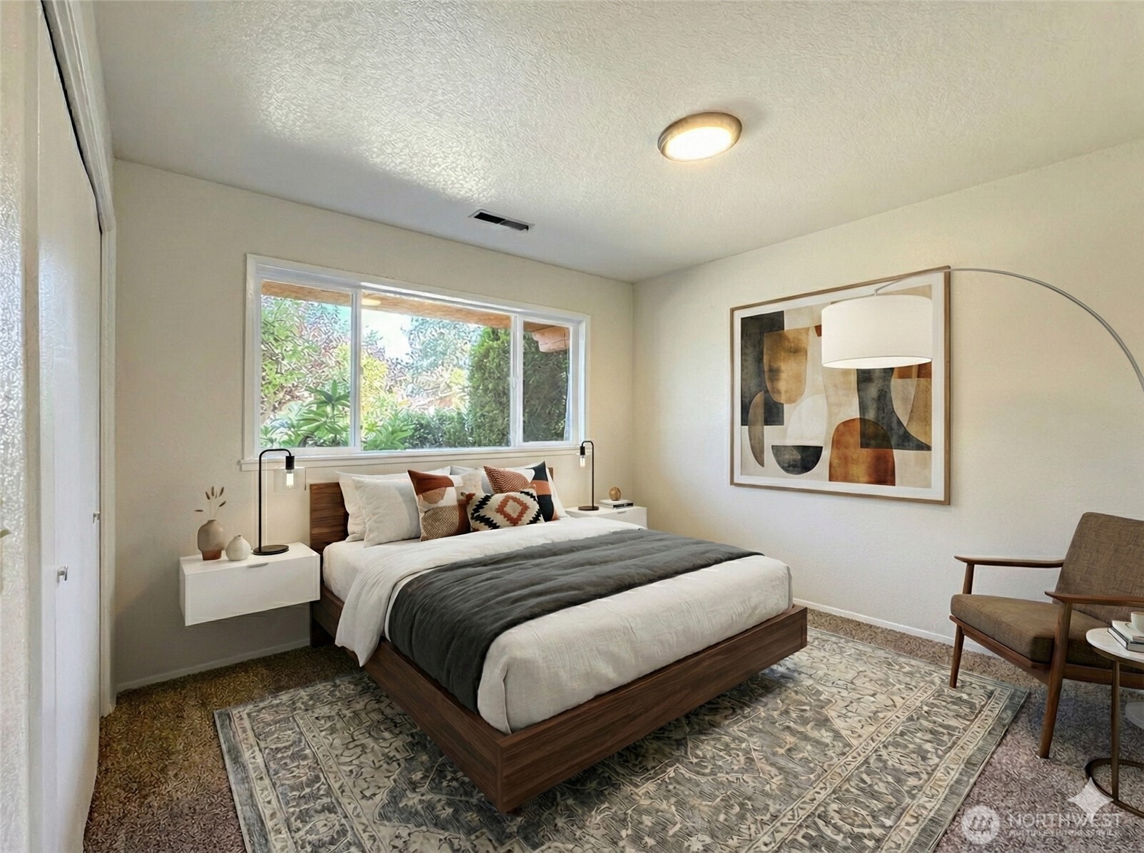 1212 Craig Avenue, Unit 3 Port Angeles, WA 98362 - Photo 21 of 38 a bedroom with a bed and a window