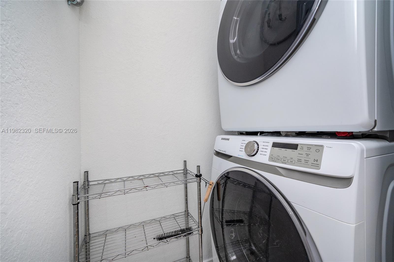13353 Southwest 250th Terrace Homestead, FL 33032 - Photo 25 of 25 a utility room with dryer and washer