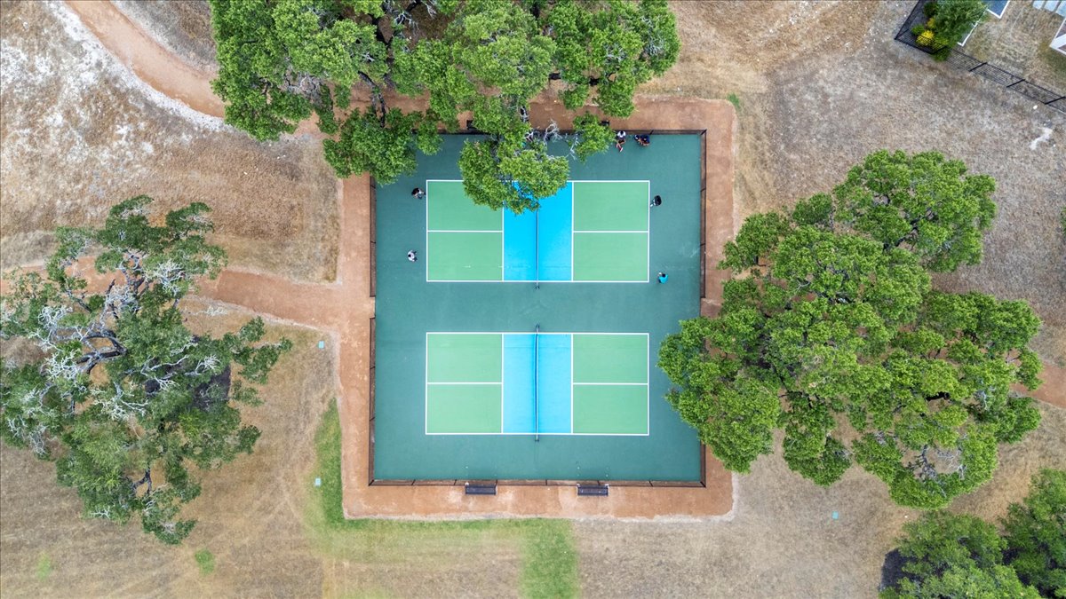 398 Trout River Road Kyle, TX 78640 - Photo 38 of 40 Bird's eye view of a pool