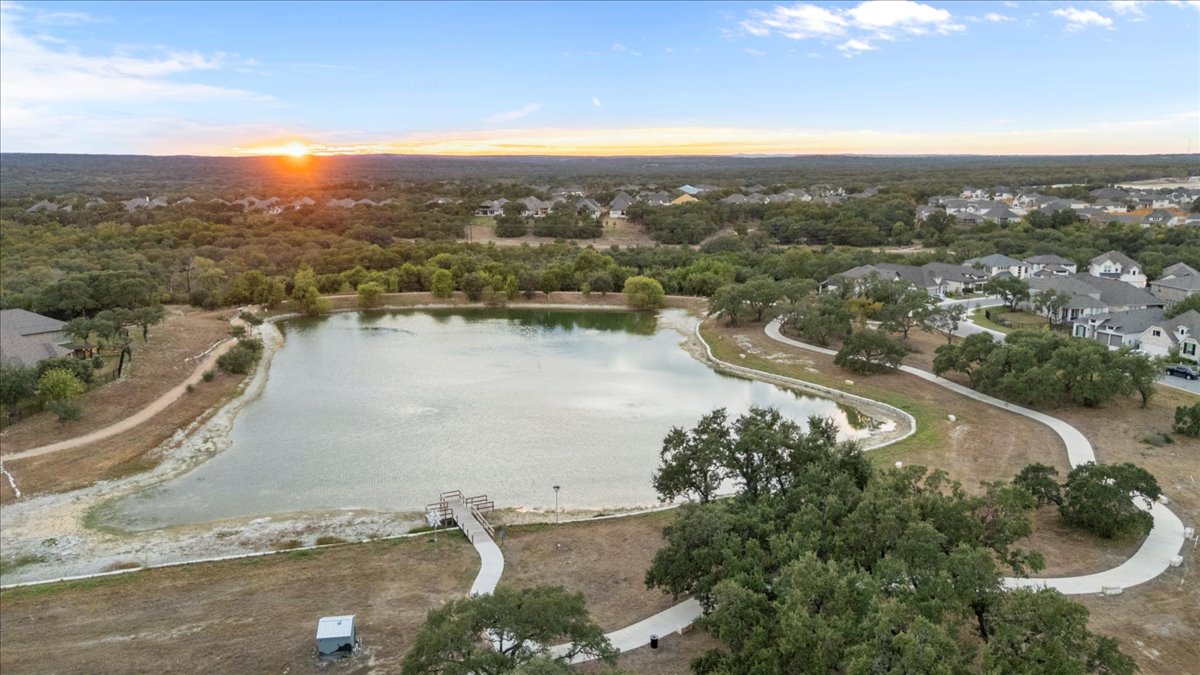 398 Trout River Road Kyle, TX 78640 - Photo 40 of 40 Aerial view at dusk of a water view