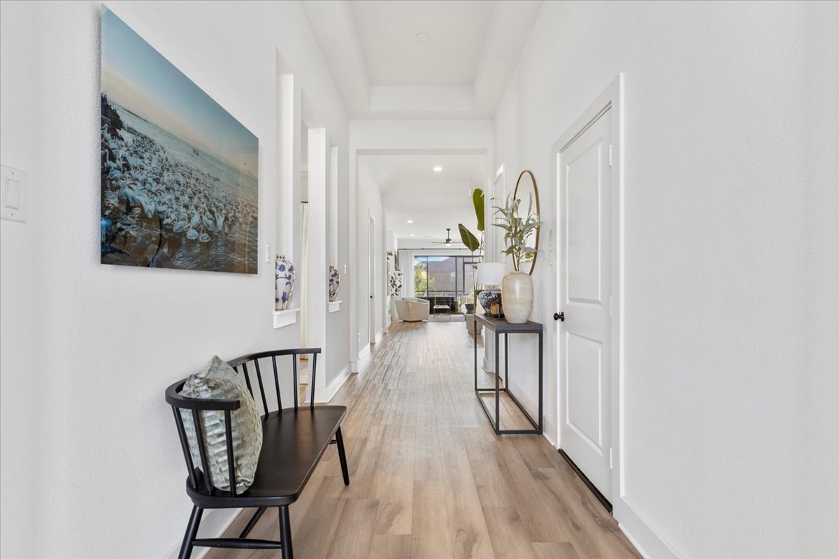 398 Trout River Road Kyle, TX 78640 - Photo 8 of 40 Hallway featuring recessed lighting and light wood-type flooring