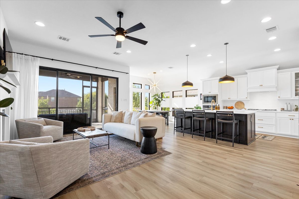 398 Trout River Road Kyle, TX 78640 - Photo 10 of 40 Living room featuring light wood-style flooring, recessed lighting, and ceiling fan