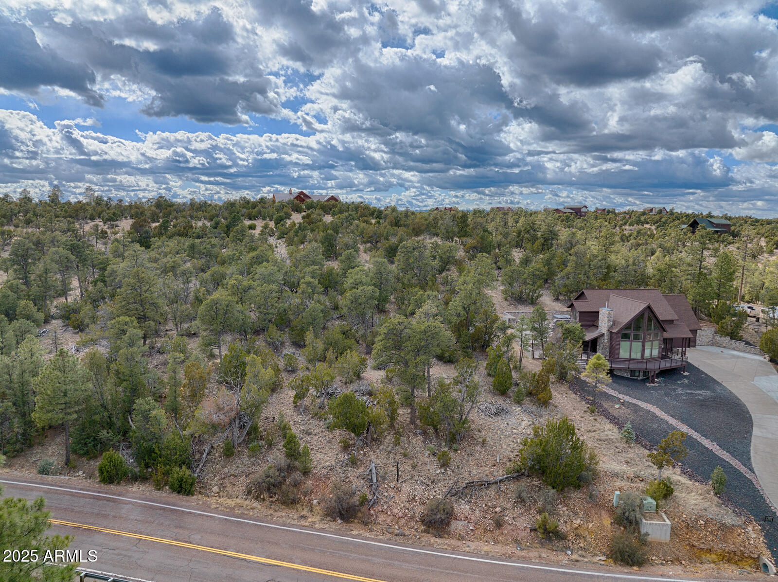 3360 Stone Bridge Trail, Unit 3 Heber, AZ 85928 - Photo 3 of 5 a view of a building with a yard