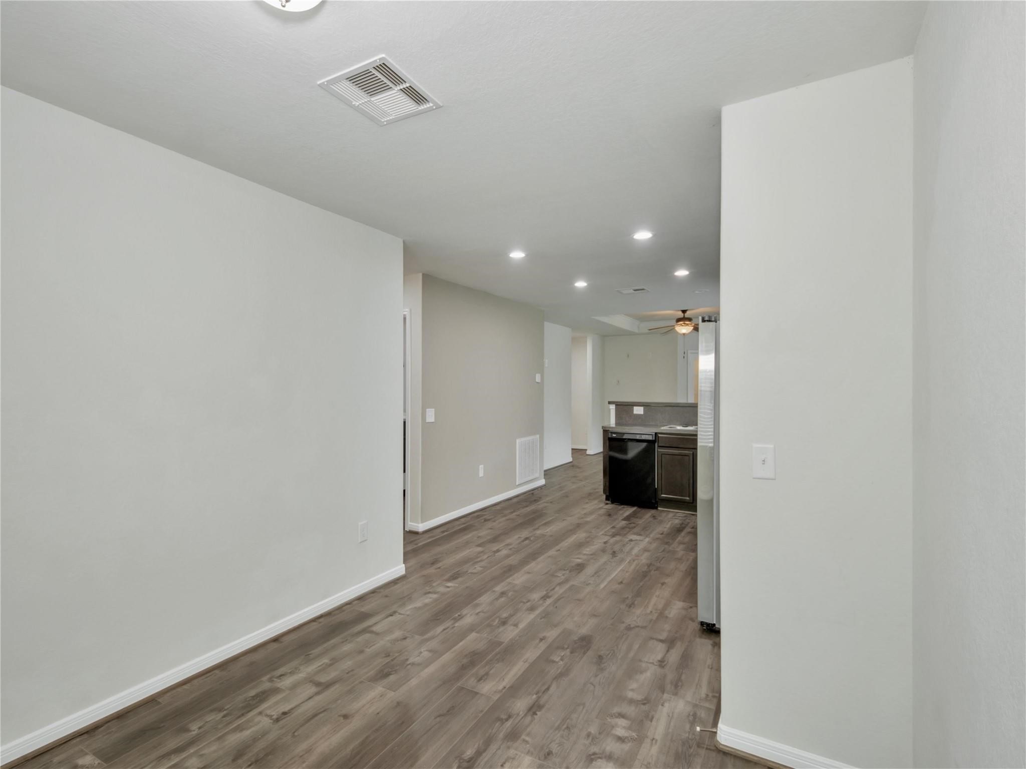 9906 Orchid Spring Lane Houston, TX 77044 - Photo 13 of 27 a view of a kitchen and a sink